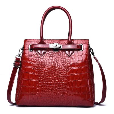 China 2023 fashion new vintage fashion patent leather women's bag fashion portable one-shoulder large women's alligator handbag for sale