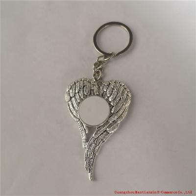 China Blank sublimation wings keychains wearing keychain with hot dad transfer printing diy materials new style for sale