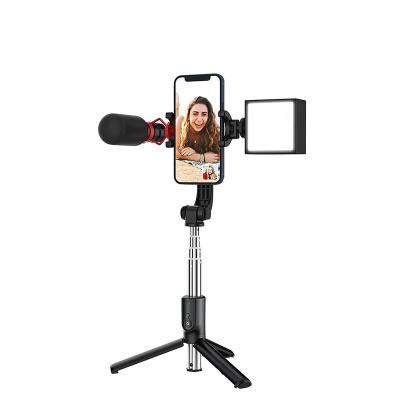 China Wireless Folding Shutter Clicker Microphone Compact 3 in 1 Portable Smartphone Selfie Stick Tripod with Light for sale