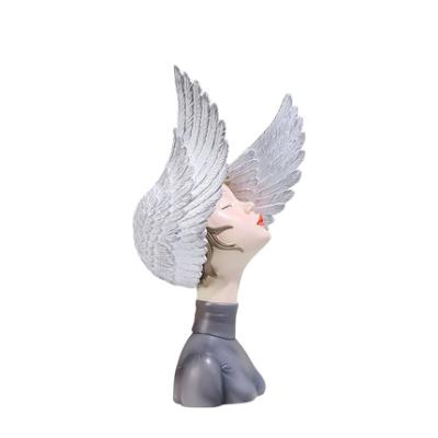 China Contemporary Nordic Style Resin Craft Decoration Ripple Wings Girl Sculpture Dream Wings Girl Figure Statues for sale