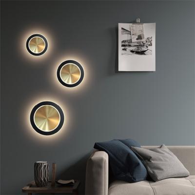 China Andromeda Sunlight Lamp Hotel Corridor LED Modern Brass Metal Disc Decorative Warm Light Around Wall Customizable Lighting for sale