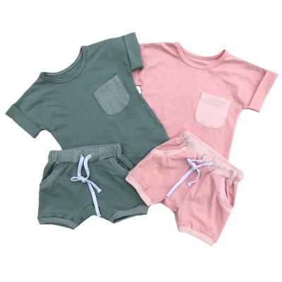 China Summer Casual Unisex Baby Tank Top Cotton Shorts Soft Sleeve Shirt With Pocket And Drawstring Shorts Toddler Casual Outfits 2pcs for sale