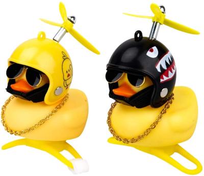 China Cute Yellow Rubber Fan Flashlight Bike Bell And Bell Pop Light Duck With Helmet for sale