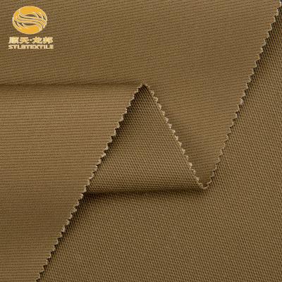 China Cotton Polyester Phone Viable Fabrics For Pants Cotton Elastane Woven Fabric Cotton Spandex Twill Wholesale Solid Dyed Fabric Stock Lot for sale