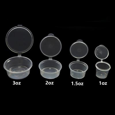 China Disposable 1.5oz Small Clear Disposable Plastic Seasoning Sauce Cup With Hinged Lid for sale