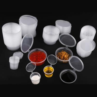 China 2oz PP Disposable Leakproof Disposable Sauce Cup Clear Plastic Part With Hinged Lid for sale