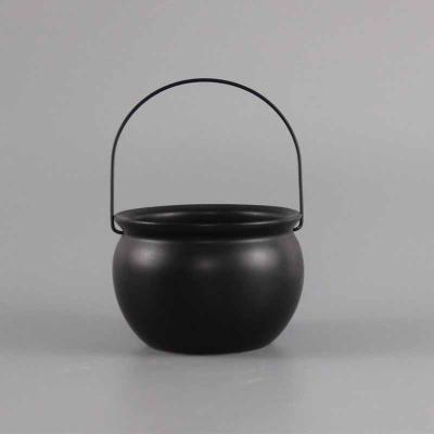 China Decorative Halloween Trick Or Treat Halloween Candy Bowl Black Ceramic Cauldron Bowl With Metal Handle for sale