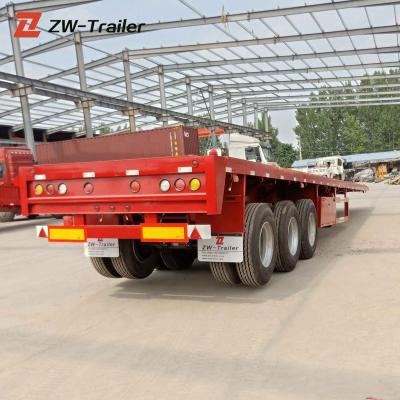 China Truck trailer cheap price used 3 axles second hand 60 tons flatbed trailers with container locks for sale