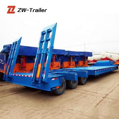 China Nigerian truck trailer market 100 ton 13m work platform 24 tires used lowbed trailer for sale