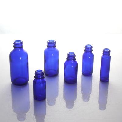 China 5ml 15ml 25ml Cobalt Blue Skin Care Serum Essential Oil Cosmetic Clear Amber Glass Dropper Bottle Sets for sale