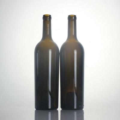 China Custom Embossed Burgundy Bordeaux Wine Bottle Heavy Antique Dead Leaf 187ml 750ml 1200g Custom Embossed Dark Green Wine Bottle for sale