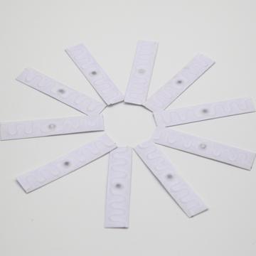 China Laundry tags for hotel high temperature resistance wafer shaped RFID laundry tags for hotel for sale