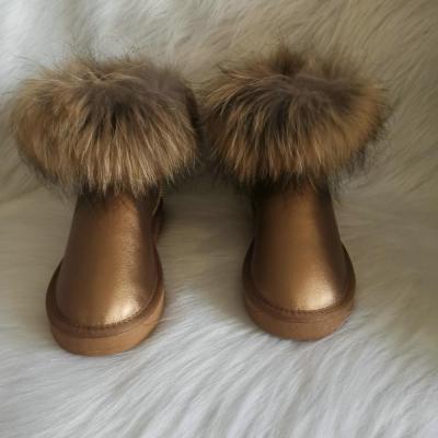 China 2019custom large size color raccoon fur snow boot fluffy gold snow boot custom logo for sale