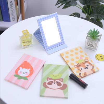 China Beautiful decorative desktop mirror folding makeup mirror installed creative portable desktop mirror for sale