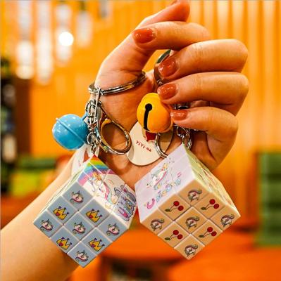 China Arts and Crafts Cute Rubik's Cube Third-order Rubik's Cube Unicorn Key Chain Pendant Colorful Rubik's Cube Gift Student Bag Pendant for sale