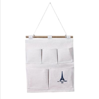 China Pen Holder Manufacturers Directly Sell Cotton and Hemp Tower Hanging Bags 5 Wall Mounted Storage Bags for Art and Fabric Sundries. for sale