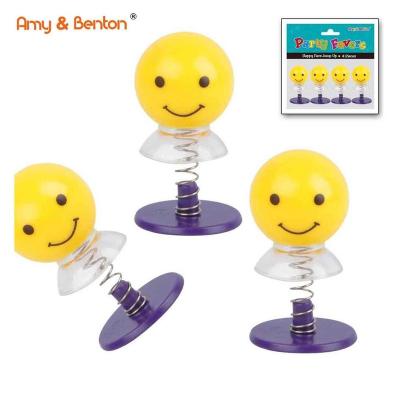 China Good Quality Juguetes Por Mayor Small Plastic Smile Faces Jump Up Toys for sale