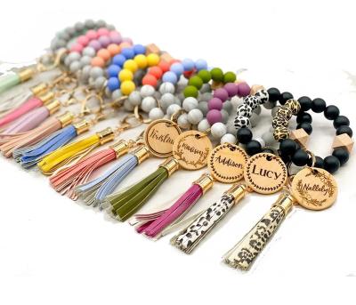 China Bag Zooying Monogram Personalized Hands Beaded Card Holder Wristband Bracelet Silicone Key Chain for sale