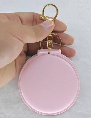 China Promotion Gift Zooyng Candy Color Fold Portable Cosmetic Mirror Pendant Key Chain for sale