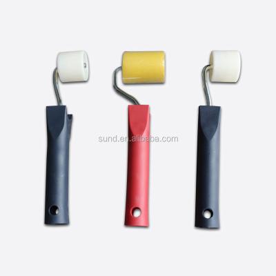 China Smooth wallpaper seam roller&wall paint roller brush with plastic handle for sale