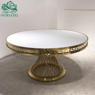 China Convertible Customized Round Wedding Dining Nest Shape Metal Gold MDF Event Table for sale