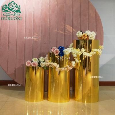 China Wedding Decoration Ouruoxi Furniture Different Size Gold Round Stainless Steel Flower Stand For Party for sale