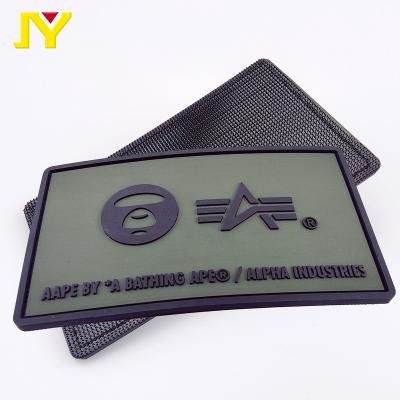 China Sustainable Clothing Backpack Shoes 3d Soft Rubber Patch PVC Silicone Label for sale