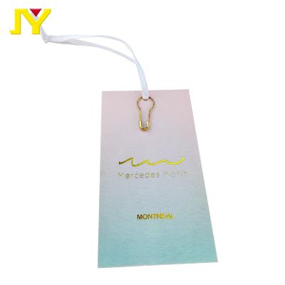 China Sustainable Custom Shape Laser Hang Tag Luxury Hanging Tag Hologram Paper Hang Tag Holographic Hangtag For Apparel Garment for sale