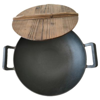 China Sustainable Household Double-Ear Wok Cast Iron Wok Pan With Wooden Thick Lid Uncoated for sale