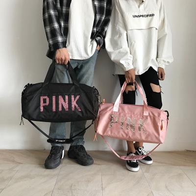 China 2021 fashion leisure sports bag fashion pink nylon weekend bags large shoulder travel luggage sports handbag for sale