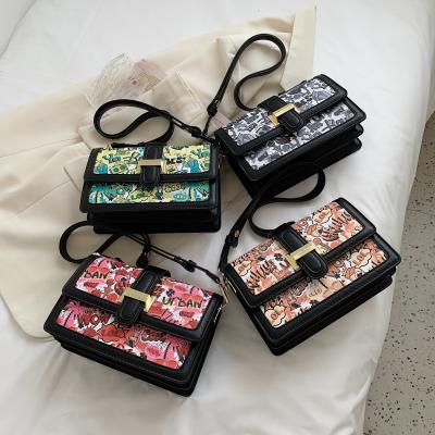 China Fashion 2021 spring and summer fashion new funny graffiti small square handbag and women's handbag evening clutch for sale