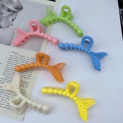 China Plastic hair accessories elegant style fishtail hair fishtail design claws hair clip colorful claws for sale