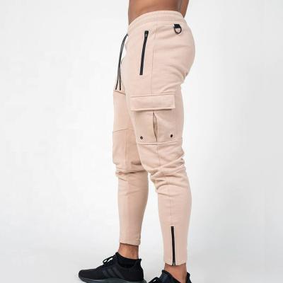 China Custom Anti-Wrinkle OEM Logo Design Cargo Pants French Terry Tapered Fit Pocket Cargo Utility Joggers For Men for sale