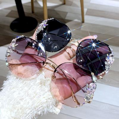 China Fashion Sunglasses Diamond Luxury Women's Rimless Sun Glasses Sun Glasses 2023 Shape Shades Sun Glasses for sale