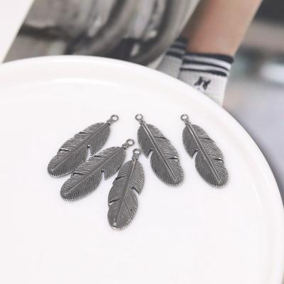 China High Quality DIY Handmade Titanium Steel Jewelry Accessories Feather Small Dangle Earrings for sale