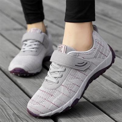 China Fashion Trend Style Slow Walking Women's Shoes Light Up Soft Soled Outdoor Running Casual Shoes Ladies Sports Shoes for sale