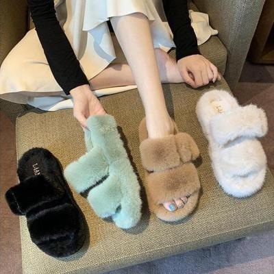 China 2021 Fashion Trend Wholesale Custom Fashion Trend Furry Slippers Warm And Comfortable Women Bedroom Slippers for sale