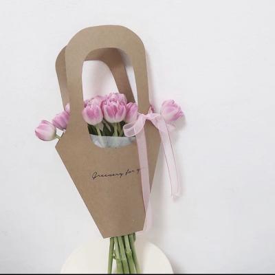 China Recycled Materials Soft Custom Printed Wedding Flower Packing Kraft Paper Bag for sale