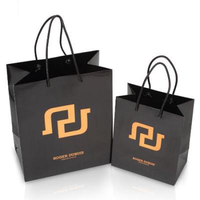 China Recycled Materials Cheap Custom Printed Luxury Retail Paper Shopping Bag,Low Cost Paper Bag,Color Paper Bag Supplier for sale