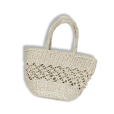 China New Fashion Women's Hollow Pull Rope Straw Bags Wholesale Casual Handbags For Ladies for sale