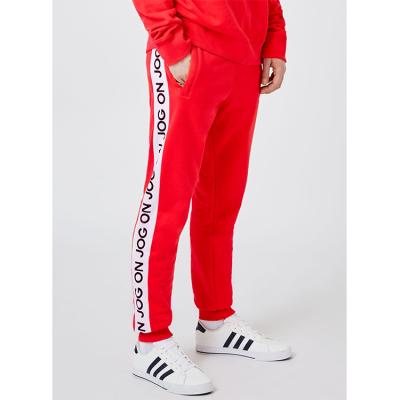 China Custom Copy OEM Anti-pilling Side Stripe Logo Jogger Pants Men for sale