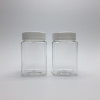 China China Wholesale Sustainable 350ml PET Clear Plastic Bottle For Honey With White Lid for sale