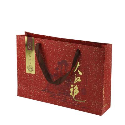 China Recyclable Customize Printed Luxury Kraft Paper Clothes Shoes Cosmetics Shopping Bag With Rope Handle Candy Paper Die Cut Bag for sale