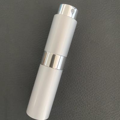 China Cosmetic Custom Empty Refillable Twist Up Travel Atomizers for sale