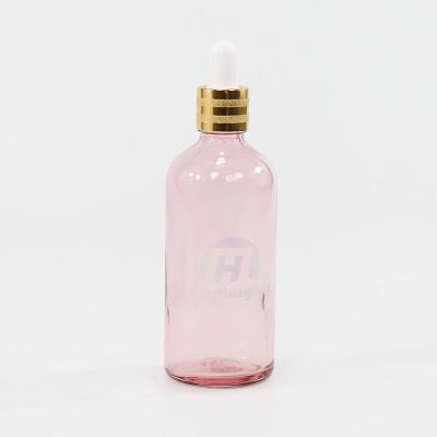 China Multi-size Cosmetic Pink Round Skin Care Essential Oil Dropper Glass Bottles For Sale for sale