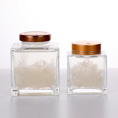 China Cheap And Small Candy Square Empty Sweet Wedding Honey Glass Jar With Metal Lid for sale