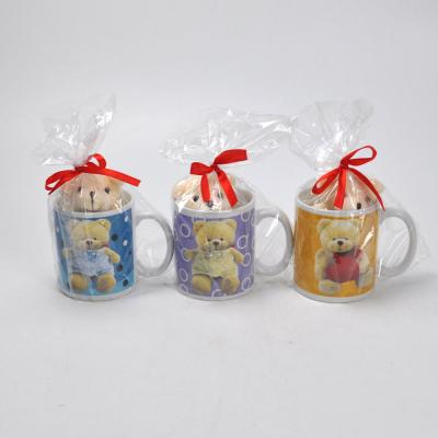 China Religious Gift 11oz Ceramic Mug With Decal , Ceramic Gift Mug With Stuff Toy For Friends for sale