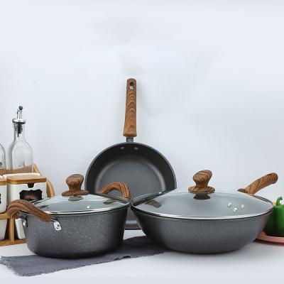 China Sustainable Aluminum Kitchen Cooking Soup Stock Pot Wok Frying Pan Cookware Sets With Glass Wood Lid Handle for sale