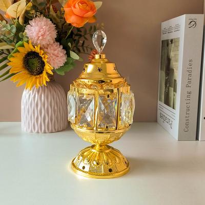 China Censer Gold Incense Holder Arabic Middle East Crystal Hollowed Censer Home Aromatherapy Decoration Censer for sale