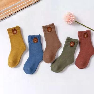 China Winter Sporty Boys and Girls Padded Overlay Kids Socks Back Patchwork Color Stylish Soft Children's Socks for sale